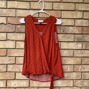 Sleeveless reddish top